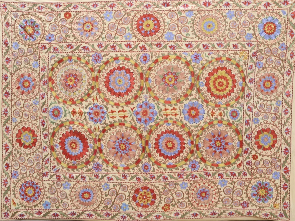 il_1140xN.5934918747_m8us Uzbek Suzani Embroidery. An Exquisite Handmade Silk on Ikat Suzani